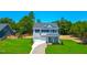 Charming two-story home with a well-manicured lawn and a classic architectural style at 355 Beacon Hill Rd # 23, Lillington, NC 27546