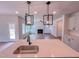 Spacious kitchen view into the living room with a fireplace and hardwood floors at 355 Beacon Hill Rd # 23, Lillington, NC 27546