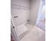 Tiled laundry room with washer and dryer hookups and a utility sink at 355 Beacon Hill Rd # 23, Lillington, NC 27546