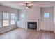 Living room features hardwood floors, a fireplace, and built-in shelving at 355 Beacon Hill Rd # 23, Lillington, NC 27546
