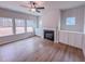 Living room features hardwood floors, a fireplace, and built-in shelving at 355 Beacon Hill Rd # 23, Lillington, NC 27546