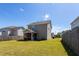 The home has a screened-in porch, a fenced-in yard, and a lush lawn at 3629 Brittlebank Dr, Raleigh, NC 27610