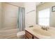 Well-maintained bathroom featuring a shower-tub combo and single vanity at 3629 Brittlebank Dr, Raleigh, NC 27610