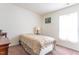 Simply furnished bedroom with neutral colors and a comfortable single bed at 3629 Brittlebank Dr, Raleigh, NC 27610