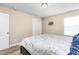 This bedroom features neutral walls, carpet floors, and a double door closet at 3832 Stovall Dr, Haw River, NC 27258