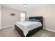 Cozy bedroom with a natural color scheme and ample natural light, creating a comfortable and serene space at 3832 Stovall Dr, Haw River, NC 27258