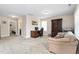Spacious bonus room with neutral tones, carpet, built-ins, and a workspace, creating a comfortable and functional living area at 3832 Stovall Dr, Haw River, NC 27258