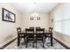 Elegant dining room with a dark wood table, rug, and a chandelier at 3832 Stovall Dr, Haw River, NC 27258