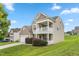 Charming two-story home with a two-car garage, landscaped yard, and second-story balcony at 3832 Stovall Dr, Haw River, NC 27258