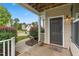 Welcoming front porch with a stylish doormat and views of the landscaped yard at 3832 Stovall Dr, Haw River, NC 27258