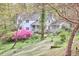 Charming home with manicured lawn and colorful flowers and plants at 4 The Gln, Chapel Hill, NC 27514