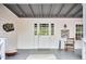 Charming covered front porch with gray painted floors, walls and ceiling at 4 The Gln, Chapel Hill, NC 27514