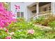 Charming home with a beautiful garden with colorful flowers and inviting front porch at 4 The Gln, Chapel Hill, NC 27514