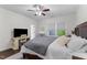 Bedroom features a ceiling fan, natural light and a desk at 433 Triumph Ln, Wake Forest, NC 27587