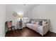 Cozy bedroom featuring daybed, accent pillows, and decor at 433 Triumph Ln, Wake Forest, NC 27587