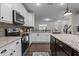 Kitchen featuring stainless steel appliances, granite countertops and an open layout at 433 Triumph Ln, Wake Forest, NC 27587
