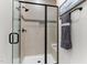 Bathroom shower features a black framed glass door and tiled walls at 433 Triumph Ln, Wake Forest, NC 27587