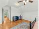 Spacious bedroom with hardwood floors, good light, and carpet on the floor at 480 Whitt Ave, Burlington, NC 27215