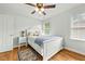 Bright bedroom with hardwood floors, ample natural light, and comfortable bedding at 480 Whitt Ave, Burlington, NC 27215