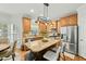 Charming kitchen with center island, stainless appliances, granite countertops and breakfast area at 480 Whitt Ave, Burlington, NC 27215