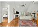 Bright living room featuring vaulted ceilings, fireplace, and a view to the bedroom at 480 Whitt Ave, Burlington, NC 27215