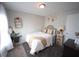 Cozy bedroom with stylish decor, natural light, and comfortable furnishings at 49 Pumpkin Hill Rdg, Clayton, NC 27520