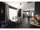 Elegant dining area showcasing stylish furnishings, modern lighting, and an open layout for seamless entertaining at 49 Pumpkin Hill Rdg, Clayton, NC 27520