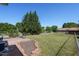 Backyard with a patio and a fenced-in yard with mature trees at 500 Lemontree Ct, Graham, NC 27253
