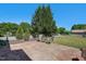 This spacious backyard features a stamped concrete patio and a green, fenced in yard at 500 Lemontree Ct, Graham, NC 27253