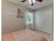 Bedroom features wood-look floors, closet, window, and neutral decor at 500 Lemontree Ct, Graham, NC 27253