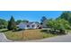 Charming single-story home featuring a well-maintained lawn and beautiful landscaping at 500 Lemontree Ct, Graham, NC 27253