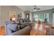 Inviting living area featuring comfortable seating, hardwood floors, and natural light at 500 Lemontree Ct, Graham, NC 27253