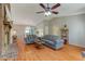 Spacious living area with hardwood floors, a fireplace, and views into the dining area at 500 Lemontree Ct, Graham, NC 27253