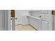 Pantry with bright white walls and adjustable shelving at 500 Old Greensboro Rd, Chapel Hill, NC 27516