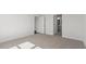 Neutral bedroom with neutral carpet and view to attached bath at 552 Lemon Daisy Ln, Knightdale, NC 27545