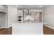 Bright kitchen with an island, stainless appliances, and a built-in double oven at 552 Lemon Daisy Ln, Knightdale, NC 27545