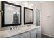 Elegant bathroom featuring double vanity sinks with a walk-in shower at 556 Lemon Daisy Ln, Knightdale, NC 27545