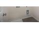 Neutral laundry room offering ceramic tile floors, washer, and dryer hookups at 556 Lemon Daisy Ln, Knightdale, NC 27545