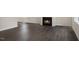 Bright living room featuring a fireplace and sleek hardwood floors at 556 Lemon Daisy Ln, Knightdale, NC 27545