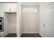 Spacious pantry area with white cabinets, perfect for storing groceries and kitchen essentials neatly at 556 Lemon Daisy Ln, Knightdale, NC 27545