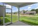 Enjoy outdoor living on the screened-in porch with neighborhood view at 556 Lemon Daisy Ln, Knightdale, NC 27545
