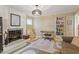 Comfortable living space with a fireplace, seating, and access to other rooms at 5713 Old Forge Cir, Raleigh, NC 27609
