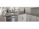 Spacious kitchen with granite counters, stainless steel appliances, and open view to the living area at 600 Sweet Iris Dr, Knightdale, NC 27545