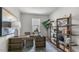 Bright and airy office space with modern desk, shelves, decor, and ample natural light at 600 Sweet Iris Dr, Knightdale, NC 27545