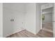 Laundry room featuring vinyl floors, shelving, and washer/dryer hookups at 6007 Austin Falls Ct, Liberty, NC 27298