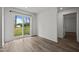 Living room with lots of natural light entering from the sliding glass door to the outside at 6007 Austin Falls Ct, Liberty, NC 27298