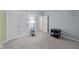 Spacious bedroom with carpet flooring, a closet, and natural light, creating a comfortable retreat within the home at 6120 Sunpointe Dr # 102, Raleigh, NC 27606