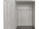 Walk-in closet offers plenty of storage space with adjustable shelving, keeping your wardrobe organized and accessible at 6120 Sunpointe Dr # 102, Raleigh, NC 27606