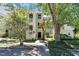 Charming condo with traditional architecture, featuring private balconies and lush landscaping at 6120 Sunpointe Dr # 102, Raleigh, NC 27606