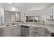 Kitchen sink and countertop with pass-through to the living room, creating an open feel at 6120 Sunpointe Dr # 102, Raleigh, NC 27606